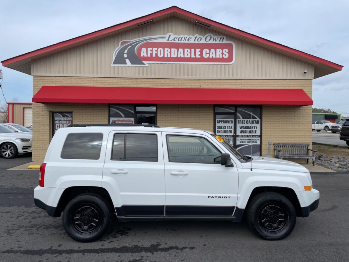 2014 White Jeep Patriot (1C4NJPBAXED) with an 4-Cyl, 2.0 Liter engine, Automatic, 6-Spd w/AutoStick transmission, located at 8008 Warden Rd, Sherwood, AR, 72120, (501) 801-6100, 34.830078, -92.186684 - Photo#0